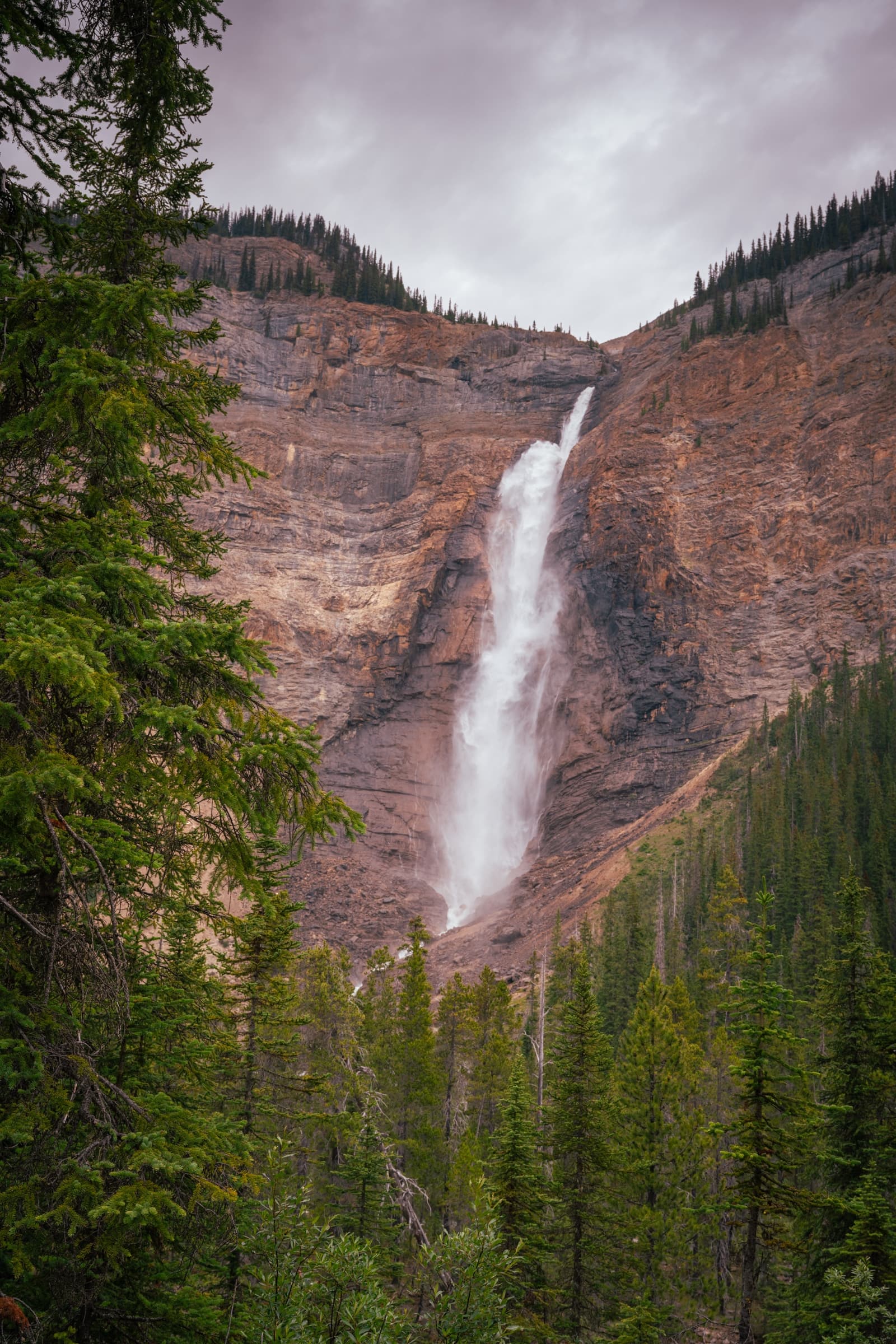 Waterfall falling down a mountain valley